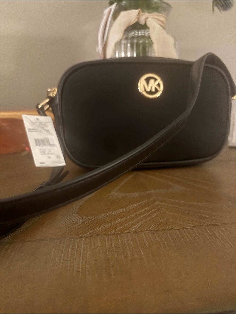 Michael Kors Black Leather Oval Crossbody with Gold MK Accent